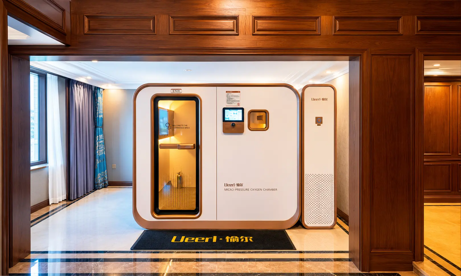 Luxury hotel wellness suite featuring a Ueerl hyperbaric oxygen chamber