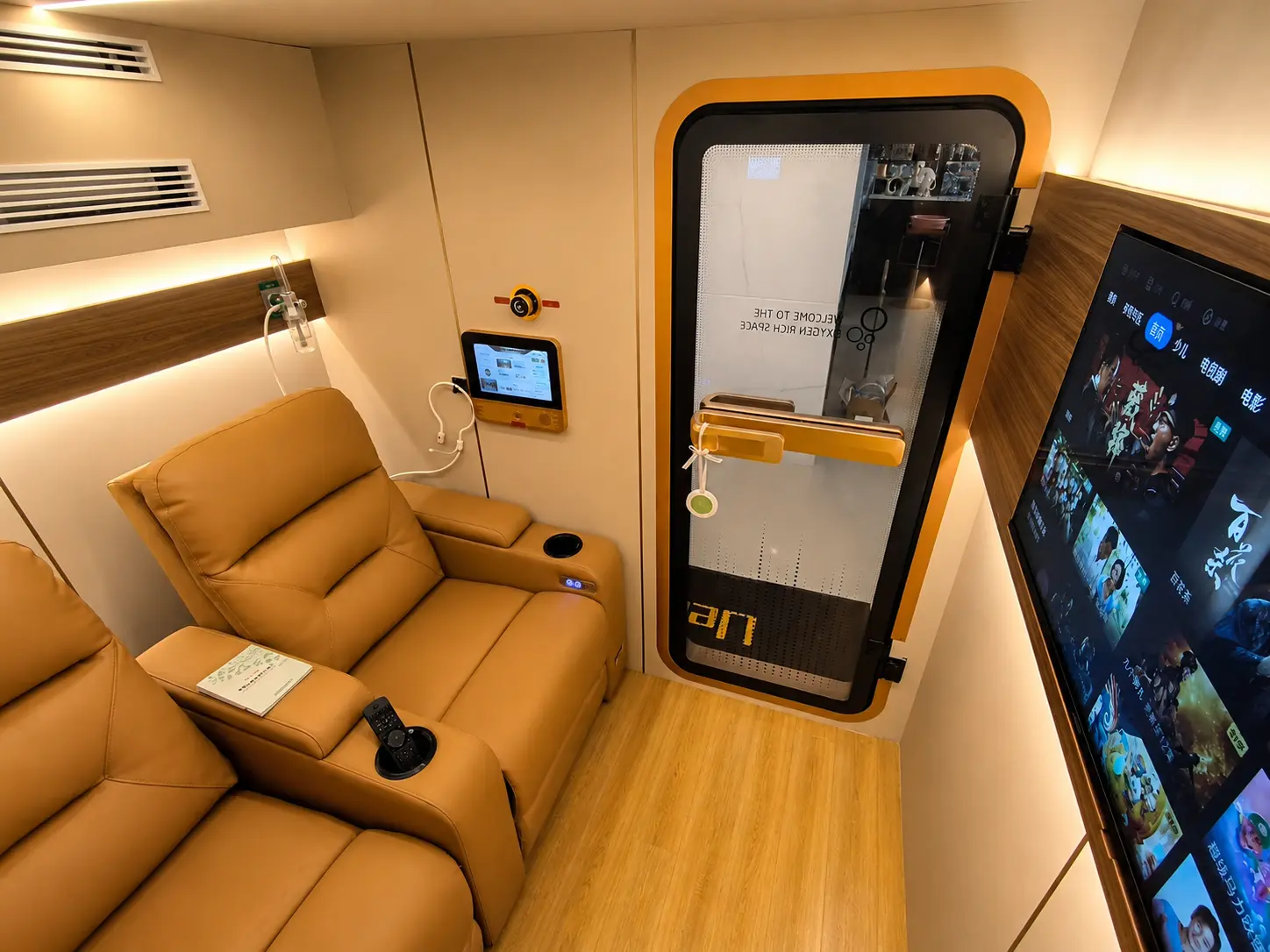 Ueerl hyperbaric oxygen chamber integrated into a premium hotel wellness room