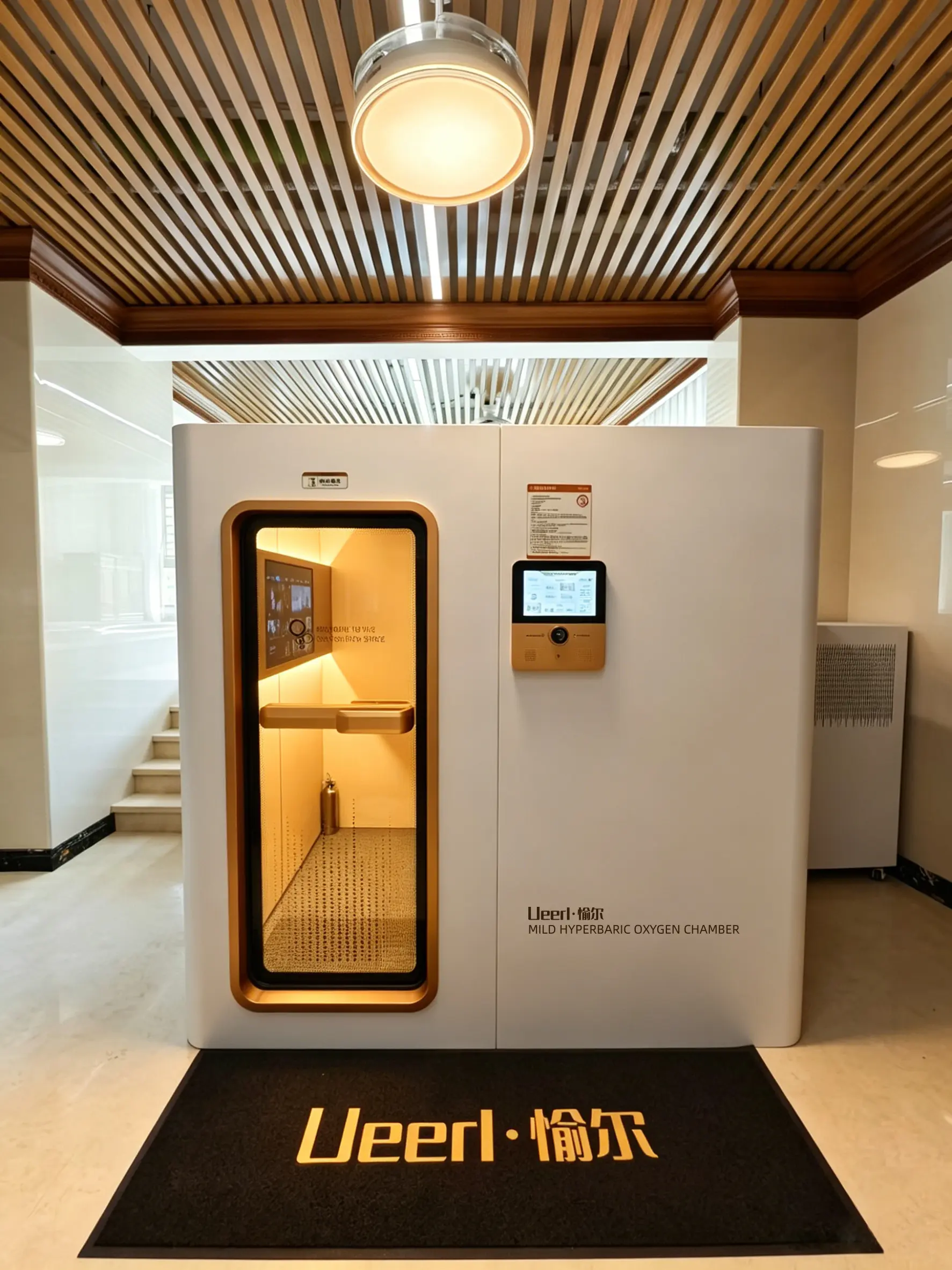 Luxury Ueerl hyperbaric oxygen chamber interior with reclining seats and entertainment features